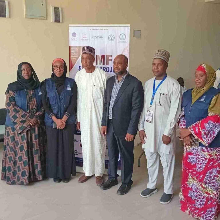 Group photo of facilitators, Dr Gana and CMD
